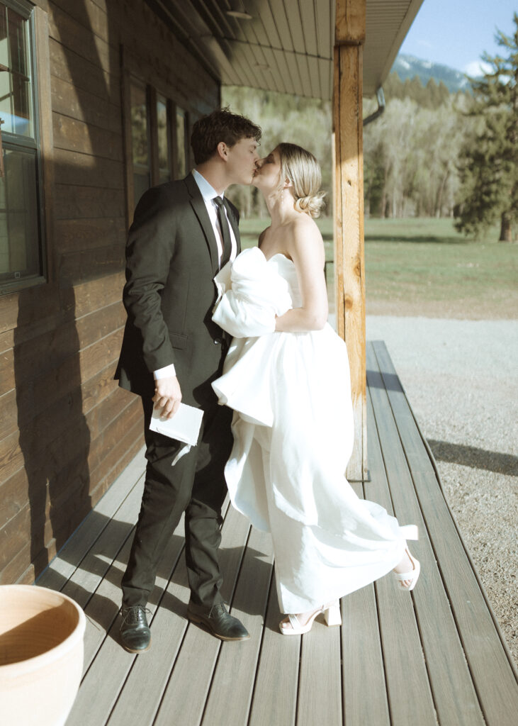couple writing their vows for their Wyoming horse elopement