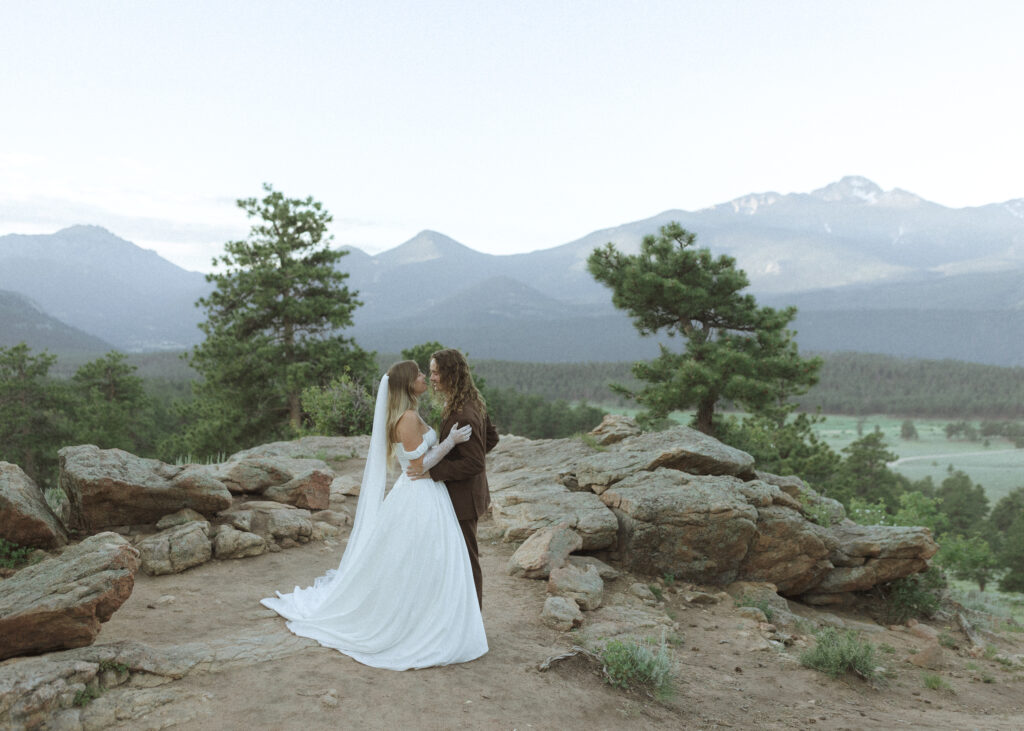 bride and groom taking photos for their 3m curve elopement 