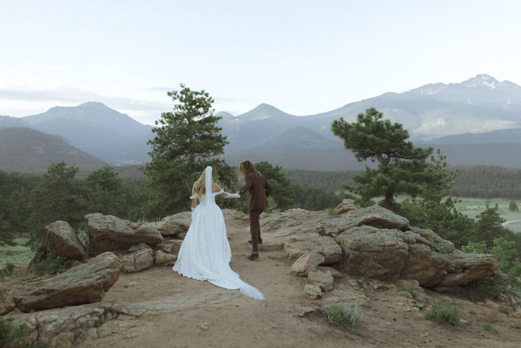 bride and groom taking photos for their 3m curve elopement 
