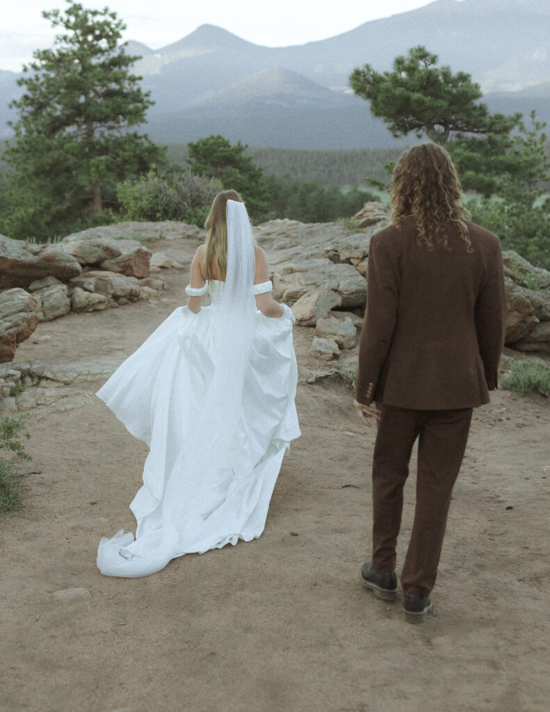 bride and groom taking photos for their 3m curve elopement 