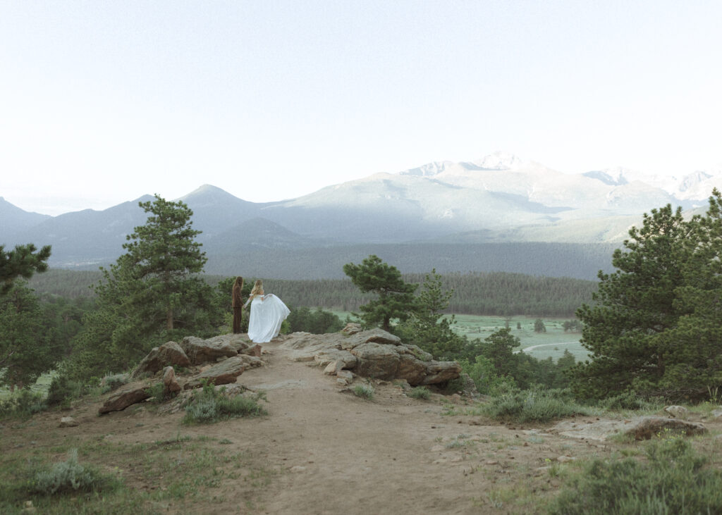 bride and groom taking photos for their 3m curve elopement 