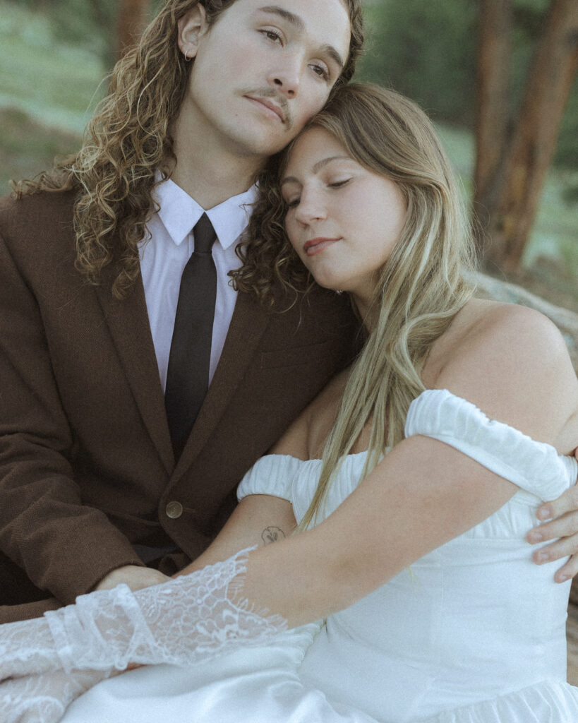 bride and groom taking photos for their 3m curve elopement 