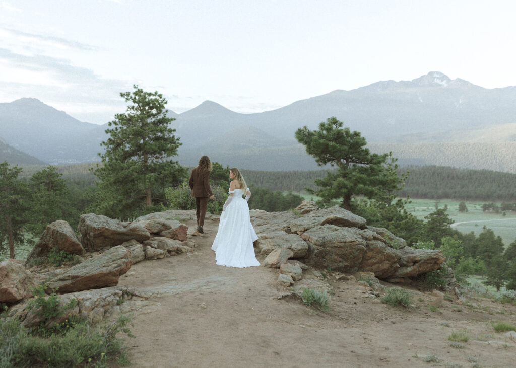 bride and groom taking photos for their 3m curve elopement 